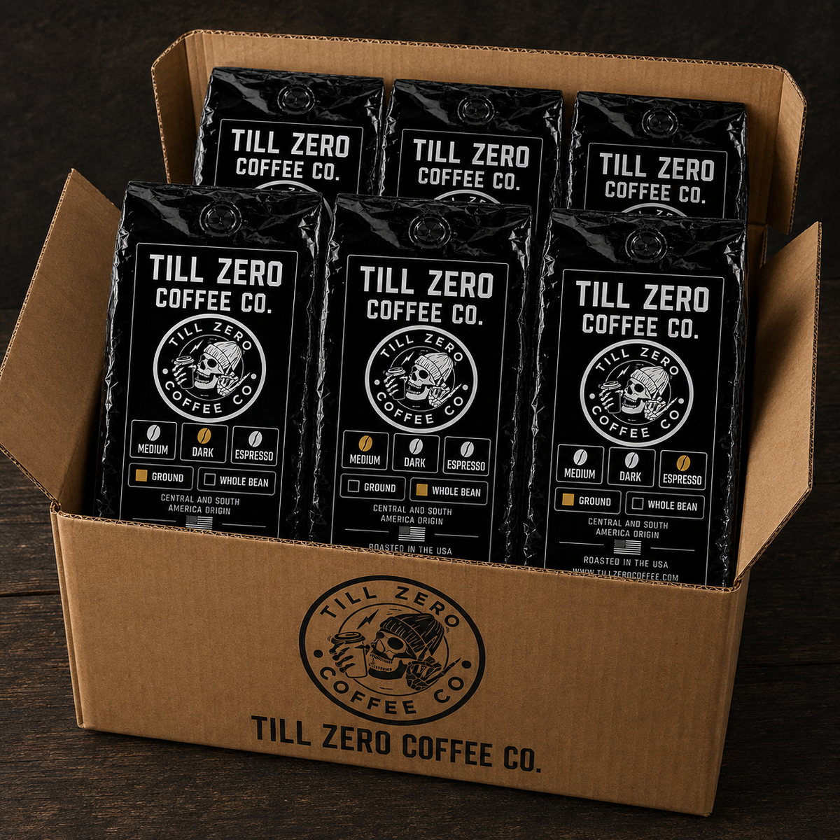 Six bags of Till Zero Coffee Co. coffee packed upright in a branded Till Zero shipping box, roast and grind checkboxes visible on every label